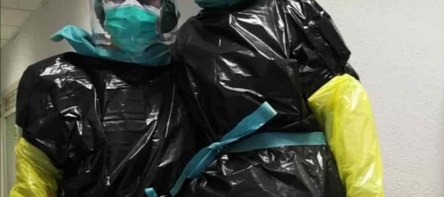 Sanidad española al borde del colapso por el coronavirus; se protegen con bolsas de basura