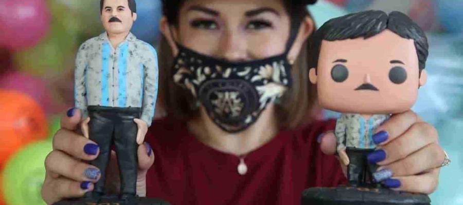 Hija de El Chapo regala a niños figuras y juguetes con la imagen de su papá