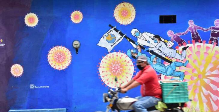 Pintan mural urbano sobre la pandemia por covid-19 en la Manga I