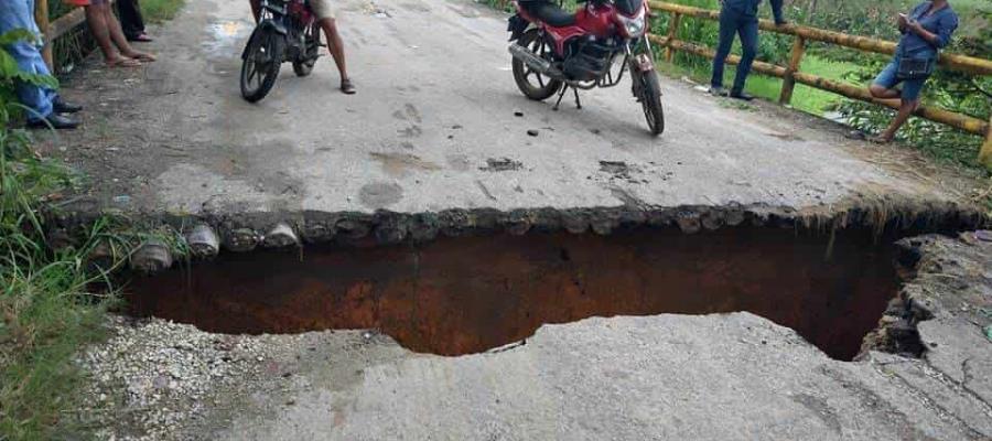 Cierran paso a automóviles en carretera Belén-Chichonal por daños en puente