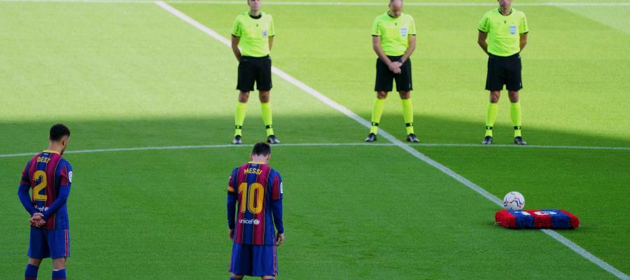 Messi, amonestado y con multa por portar jersey de Maradona