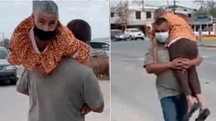 En Coahuila hombre lleva cargada a su mamá a un centro de vacunación para que sea inoculada 