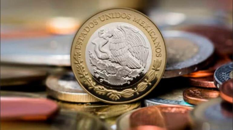 ´Sufre´ peso mexicano; rebasa las 20 unidades por dólar por primera vez en dos años