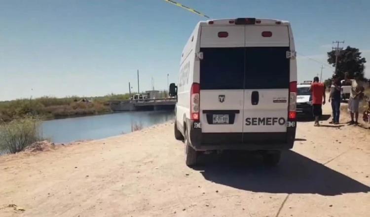 Niños mueren abrazados tras caer a canal en Sonora