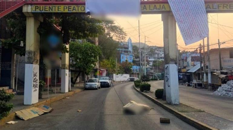 En Acapulco, hallan 4 cuerpos; dos fueron colgados en puente