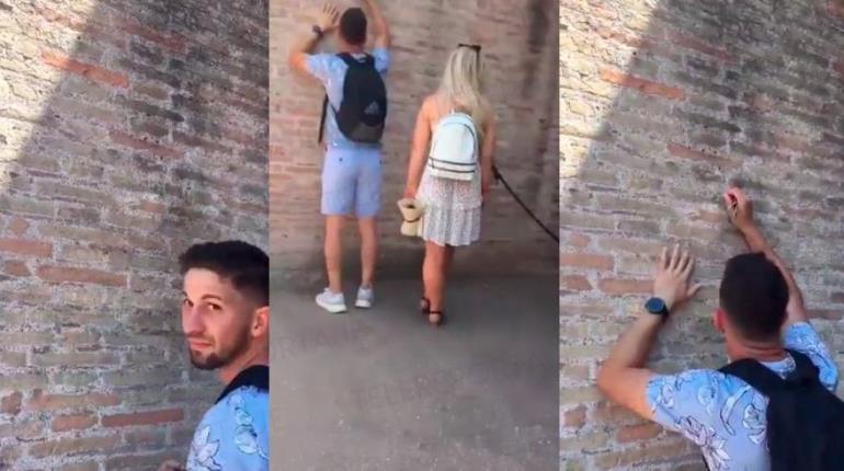 Exhiben a turista grabar su nombre y el de su novia en pared del Coliseo Romano