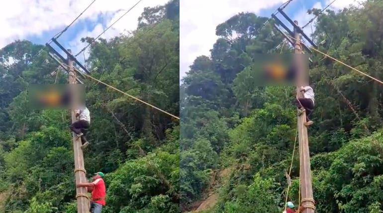 Sujeto recibe descarga eléctrica y queda colgando de poste de CFE, en Tacotalpa