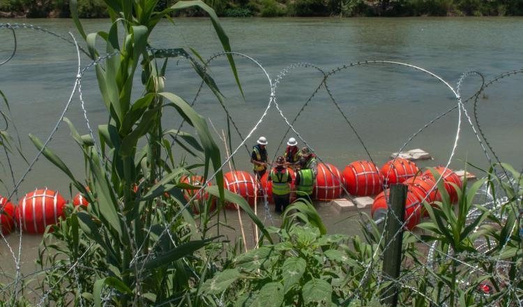 Encuentran cuerpo sin vida atorado en las boyas colocadas en el río Bravo