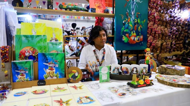 Pintura popular en la Feria Tabasco con artista macuspanense