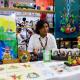 Pintura popular en la Feria Tabasco con artista macuspanense