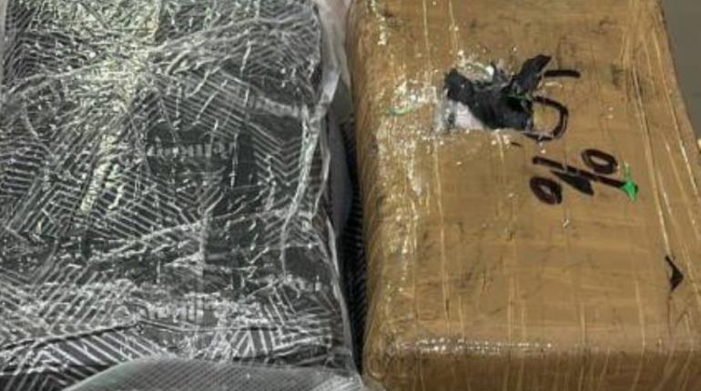 Detienen a rumanos con 14 kilos de cocaína en el AICM