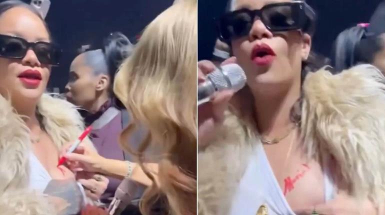 ¡Un encuentro entre divas! Mariah Carey firma el pecho de Rihanna en pleno concierto navideño