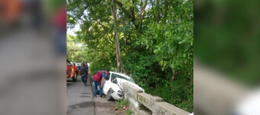 Un herido, saldo de choque contra cabezal de puente en Tacotalpa; un menor sale ileso Un herido, saldo de choque contra cabezal de puente en Tacotalpa; un menor sale ileso