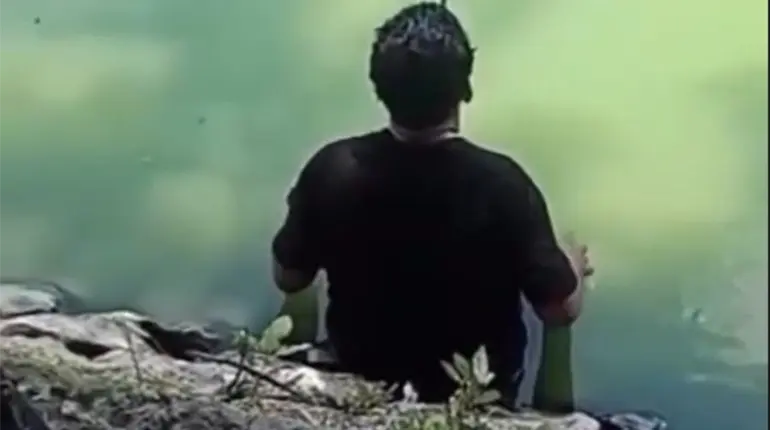 Hombre se mete a la Laguna de las Ilusiones para "retar" a cocodrilo