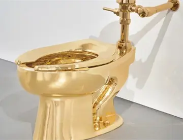 Subastan retrete de oro sólido en más de 12 mdd en Nueva York