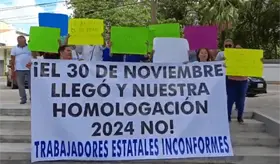 Marchan burócratas en exigencia del pago de la homologación salarial