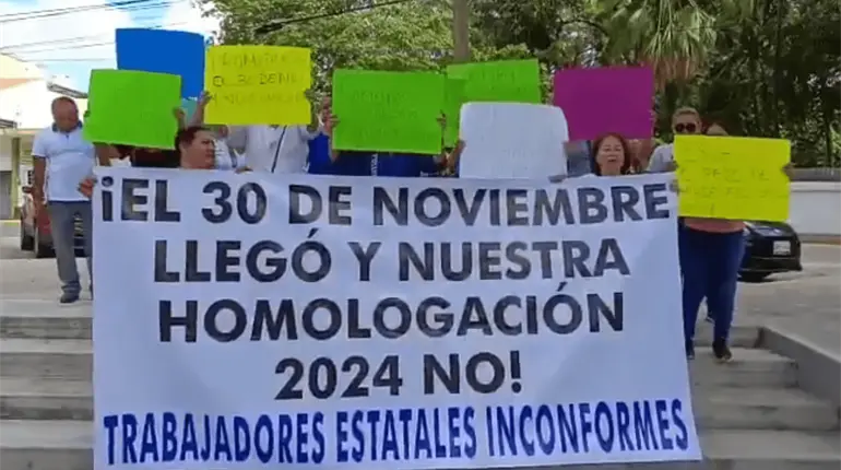 Marchan burócratas en exigencia del pago de la homologación salarial