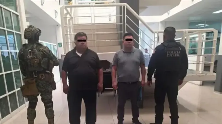 Detienen en Edomex a dos hombres con armas, camioneta blindada y 37 mdp en efectivo