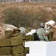 Halla GN 2 campamentos con armas en Aguililla, Michoacán
