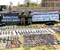 Fuerzas Armadas localizan arsenal oculto en tambos enterrados en Sinaloa