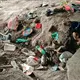 Retiran a migrantes y nacionales de asentamiento irregular bajo el malec&oacute;n de Villahermosa
