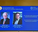 Otorgan Premio Nobel de Econom&iacute;a a los estadounidenses Robert E. Hall y Michael Woodford